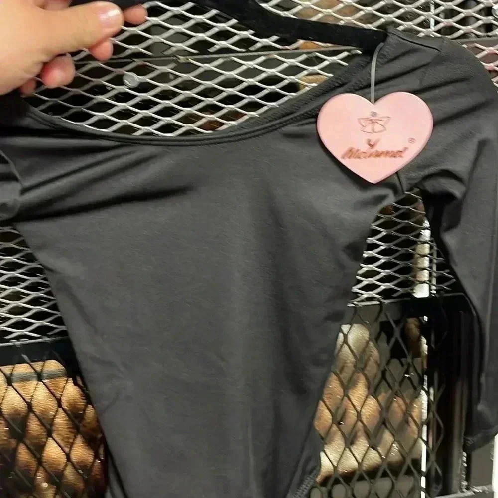 Girls dance/gymnastics top. Black . New with tags. By Mdnmd.